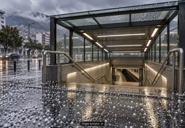 Ilustración con IA de una entrada genérica de metro con granizo en el pavimento